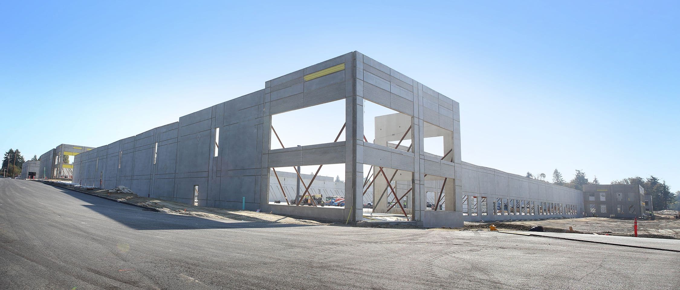 Large commercial tilt-up concrete building under construction by MZ Solution