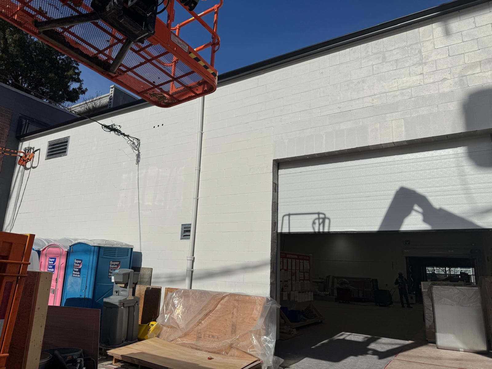 Finished exterior wall with a clean, uniform repaint